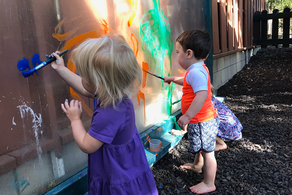 two children painting