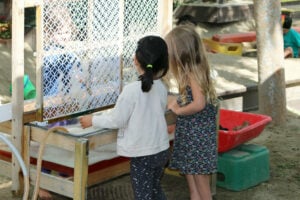 young children playing outside